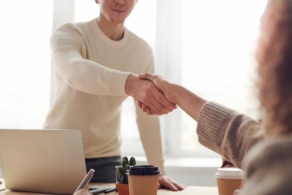 2 people shaking hands, Company reputation