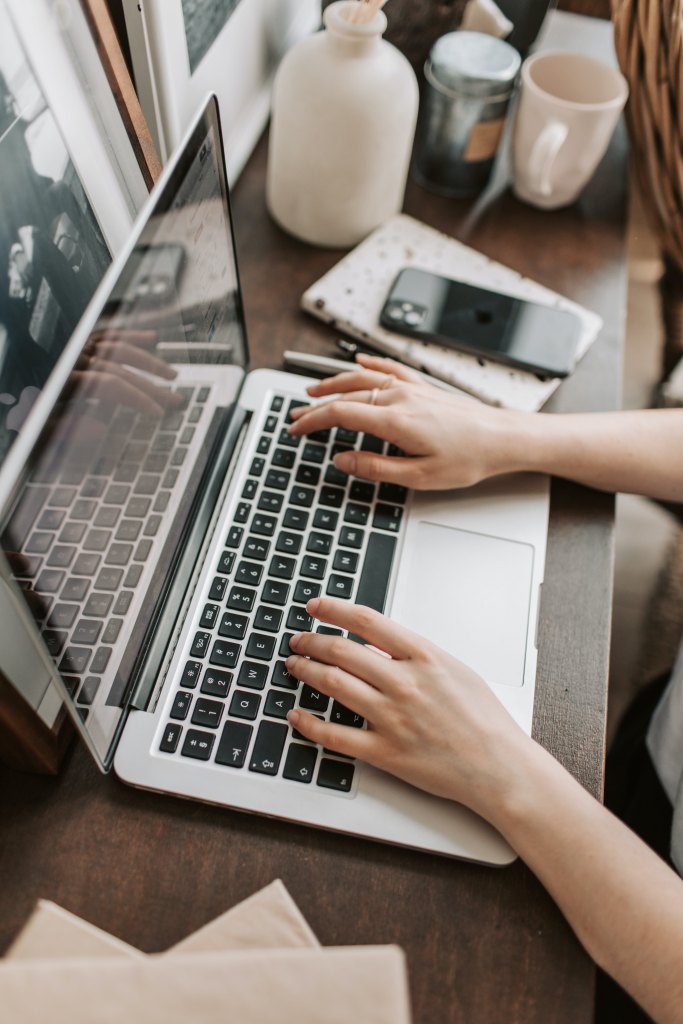 typing on a silver laptop, reputation mistakes